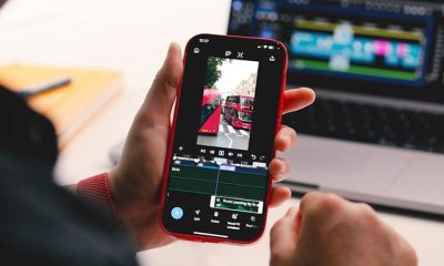Un creador edita videos con Adobe Premiere en su iPhone, aprovechando herramientas profesionales y funciones de inteligencia artificial.