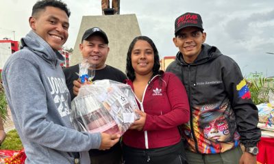 Jóvenes emprendedores reciben kits productivos en el urbanismo El Chorrito, Los Teques, impulsando la economía local.