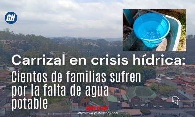 Vecinos de Carrizal llenan sus recipientes de agua mientras esperan que Hidrocapital restablezca el suministro en sus sectores.