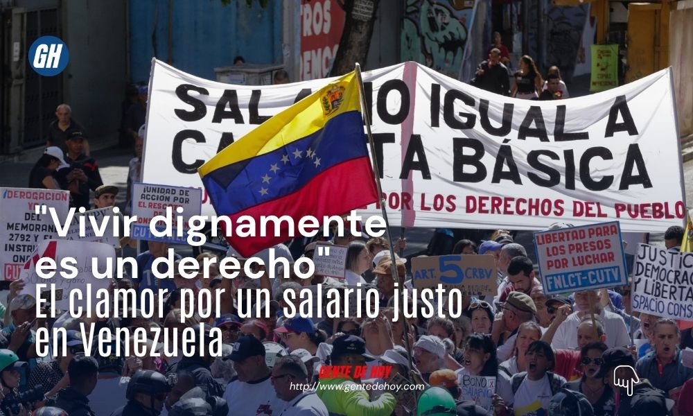 Manifestantes sostienen pancartas durante la jornada de protesta en Caracas, exigiendo que el salario mínimo cubra la canasta básica y respete los derechos constitucionales.